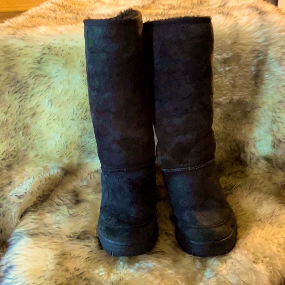 Tall UGG black boot. Size 8.
